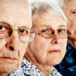 Three grumpy seniors two men one woman frowning disappointed rapideye 150x150