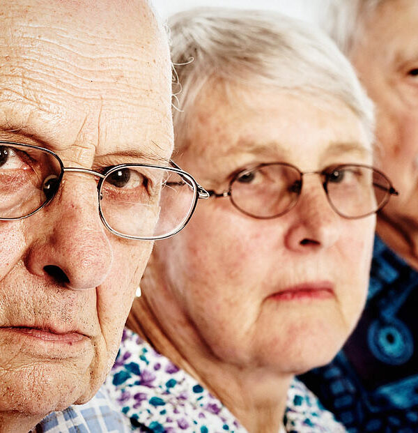 Three grumpy seniors two men one woman frowning disappointed rapideye 600x621